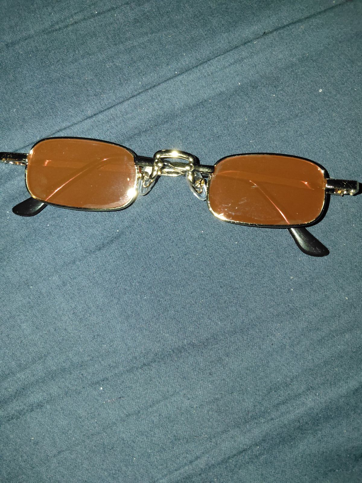 Red shades small gold frame