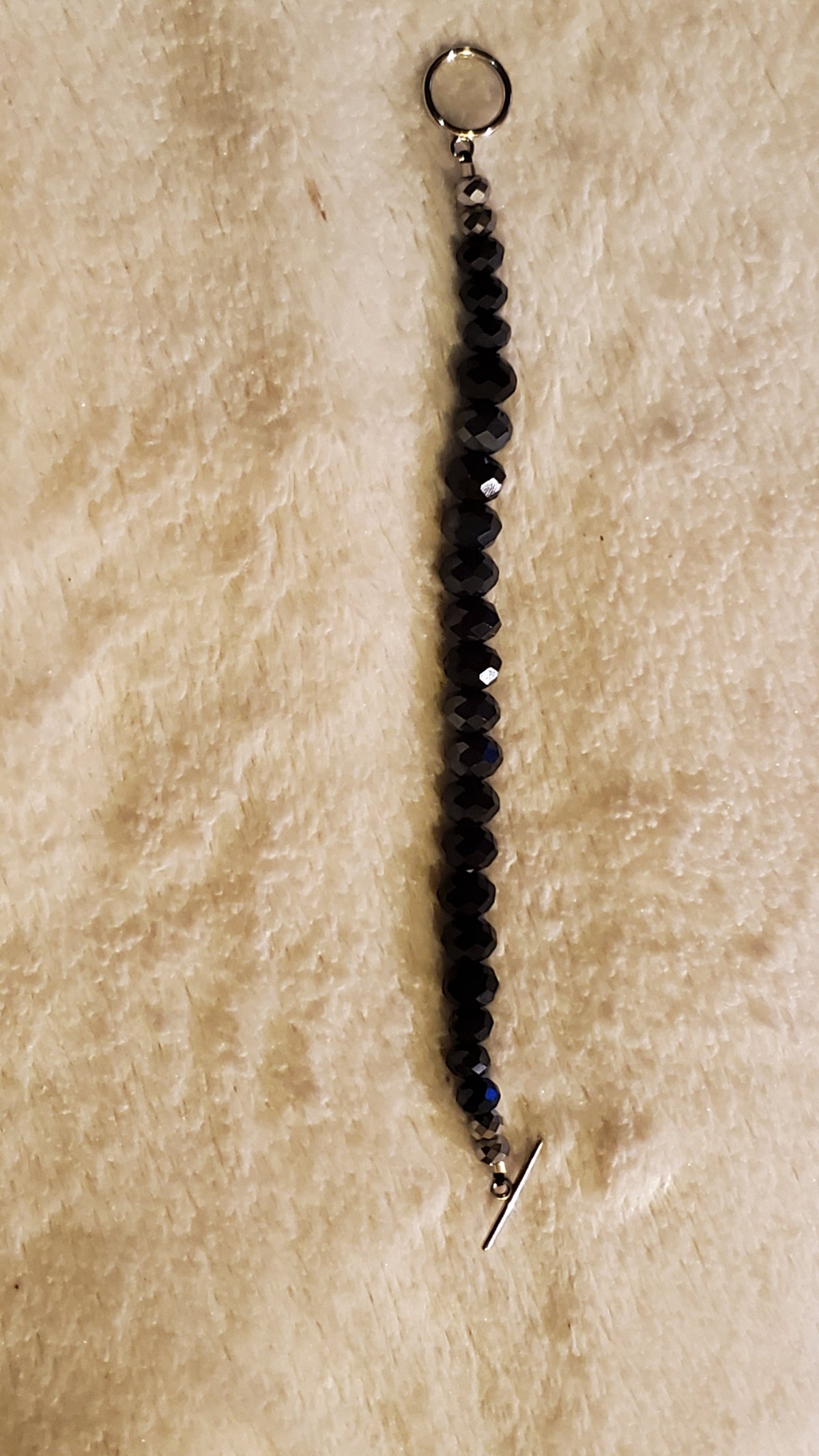 Black rondell toggle bracelet